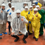 Smiling sanitation team with their thumbs up